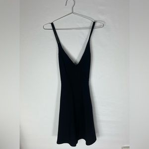 Kimchi Blue. Medium Black and flowy spaghetti strap dress.